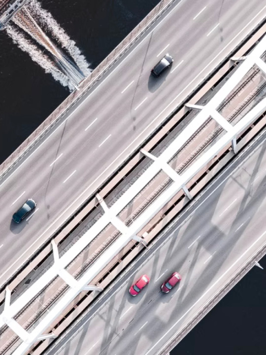 A bridge with moving cars from above